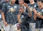  ?? David Zalubowski, The Associated Press ?? McKinley Wright IV gestures to the small crowd. He is the first Pac-12 player with 1,600 points, 600 rebounds and 600 assists.