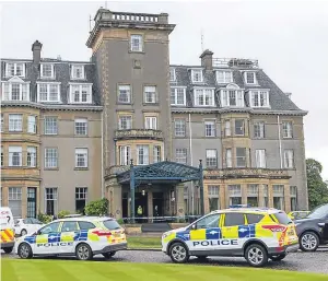  ?? Picture: Steven Brown. ?? Police at Gleneagles Hotel last June. Two men have denied charges of robbery at the five-star resort.