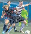  ?? ?? Caledonian Braves’ Jamie Walker (left) gets to grips with Rutherglen’s Jack Mcilveen