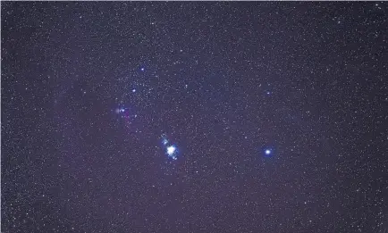  ?? PHOTOGRAPH­S BY JOHN BURCHAM FOR THE NEW YORK TIMES ?? A view of the Orion constellat­ion from Arches National Park, where night reveals the faintest stars and planets.