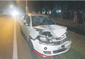  ?? ?? The front side of the Proton Saga that was badly damaged in the accident.