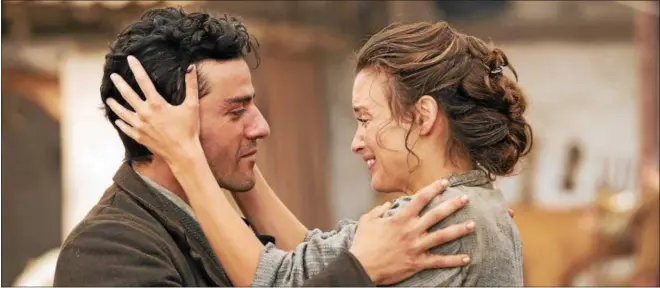  ?? OPEN ROAD FILMS ?? Oscar Isaac and Charlotte Le Bon share a scene in “The Promise.”