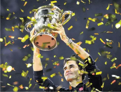  ?? AFP ?? Roger Federer war nach seinem neunten Sieg an den Swiss Indoors in Basel «gerade der glücklichs­te Mensch».