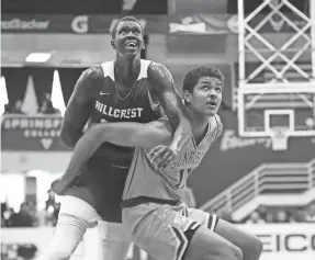  ?? GREGORY PAYAN/AP ?? Hillcrest Prep’s Makur Maker, left, said he hoped his decision to play at Howard would start a movement of elite prospects playing for HBCUs.