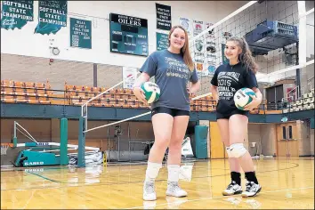  ?? DAVE MELTON/POST-TRIBUNE ?? Senior middle hitter Makenzy Crocker, left, and senior libero Lea Zorich will lead Whiting into an abbreviate­d season after the school board voted Sept. 18 to reinstate fall sports.