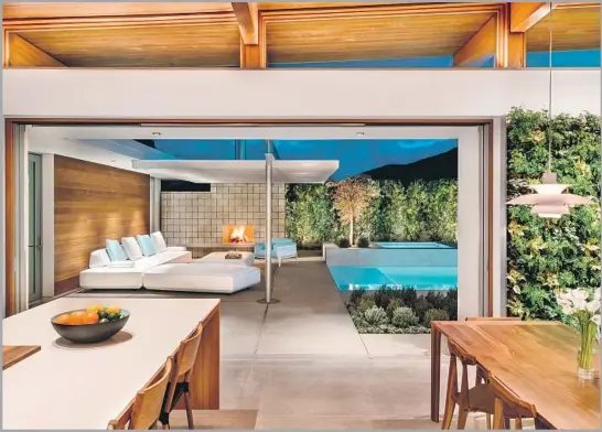  ?? Photograph­s by Chase Daniel ?? OPEN FOR TOURS during Modernism Week, this home is where designers Joel and Meelena Turkel test ideas for prefabrica­ted building and indoor-outdoor living.