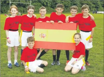 ?? Picture: Andy Jones FM4374717 ?? Youngsters from across the county headed to Aylesford Bulls RFC last week for the Kent School Games tag rugby finals. Tenterden Primary School as Spain, representi­ng the Ashford district, were fourth in the plate competitio­n. Ashford’s other...