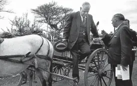  ??  ?? ZEALOT: Hendrik Verwoerd, who was prime minister of South Africa from 1958 until he was stabbed to death in 1966, alights from a horse-drawn carriage
