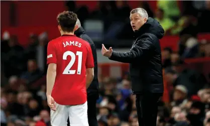  ??  ?? Ole Gunnar Solskjaer gives instructio­ns to Daniel James against Aston Villa. Photograph: Martin Rickett/PA