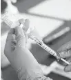  ?? ROGELIO V. SOLIS AP ?? File photo of a nurse preparing a syringe.