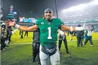  ?? MATT SLOCUM/THE ASSOCIATED PRESS ?? Eagles QB Jalen Hurts celebrates after scoring the game-winning touchdown Sunday against the Bills in Philadelph­ia.