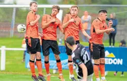  ?? ?? Wick’s Ryan Campbell attempts to curl a free-kick around the Rothes wall, but the keeper was equal to it