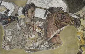  ??  ?? ABOVE LEFT: Alexander the Great, detail of the Alexander Mosaic, circa 100 B.C, now preserved in the Naples National Archaeolog­ical Museum.
ABOVE RIGHT: Apse mosaic in basilica of San Vitale, Ravenna, Italy. Built 547. A.D.