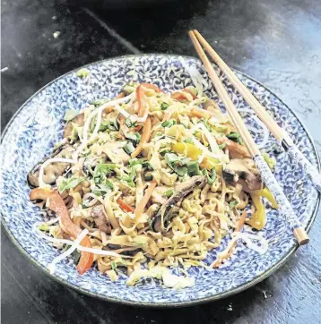  ?? GRETCHEN MCKAY Pittsburgh Post-Gazette/TNS ?? Shiitake mushrooms stand in for beef in this veggie-forward chow mein.