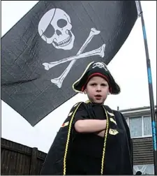  ??  ?? Shiver me timbers: Anthony with his banned Jolly Roger