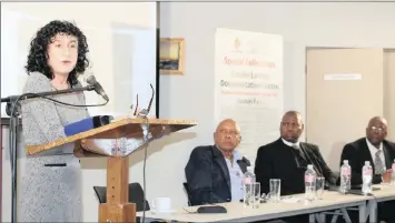  ??  ?? Roshan Dadoo delivers her speech, while panellists Kreesan Naicker, ANC treasurer-general Zweli Mkhize and Mthetheli Xuma listen.