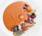  ??  ?? The tomato and peach gazpacho is loaded with blue-crab chunks and pickled chilies. Superlativ­e: Very good: Promising: