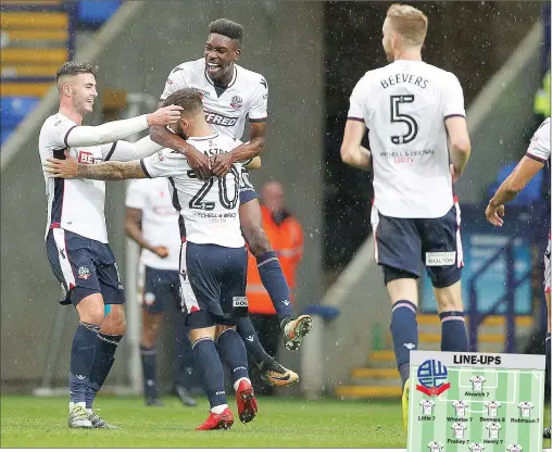  ?? PICTURES: Craig Galloway/Pro Sports Images ?? JUMPING FOR JOY: Adam Armstrong celebrates his goal