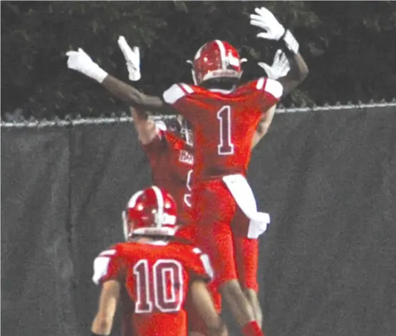  ?? FOR THE SUN- TIMES ?? Marist sophomore Jadon Thompson ( 1, celebratin­g with teammates after scoring against Brother Rice last fall) already has several scholarshi­p offers.