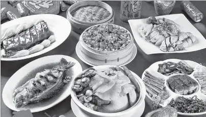  ?? SUBMITTED PHOTO ?? The New Year’s Eve Feast is the most significan­t meal of the year. It commonly served with at least 10 dishes, chicken, duck, fish and meat should be all included, meaning a prosperous new year.