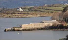  ??  ?? Peer’s Pier: The disputed pier and building on Mulroy Bay in Co. Donegal