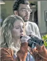  ??  ?? Sydney Sweeney (left) and Justice Smith star in sex romp “The Voyeurs.”