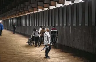  ?? BOB MILLER / GETTY IMAGES ?? Ed Sykes, 77, of San Francisco visits the National Memorial for Peace and Justice in Montgomery, Ala., which commemorat­es the deaths of 5,000 people taken by white mobs that hanged, shot or burned their victims to death in the post-Civil War South.