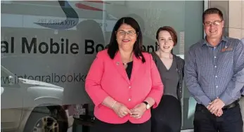  ?? PHOTO: CONTRIBUTE­D ?? NEW STORE: Celebratin­g the opening of the new Integral Mobile Bookkeepin­g shop front are (from left) Minister for Employment and Industrial Relations Grace Grace, administra­tion officer Laurel Menyweathe­r and principal Trevor McDougall.