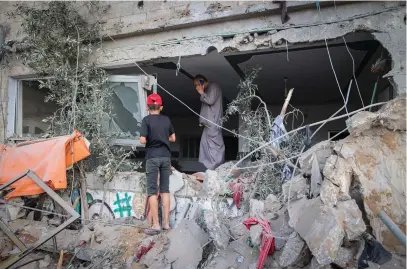  ?? (Yossi Aloni/Flash90) ?? THE BUILDING in Rehovot hit by a rocket fired from the Gaza Strip, killing one person, last week: Islamic Jihad killed only civilians – at least four Palestinia­ns in Gaza, a Palestinia­n in Israel and an Israeli in Rehovot.