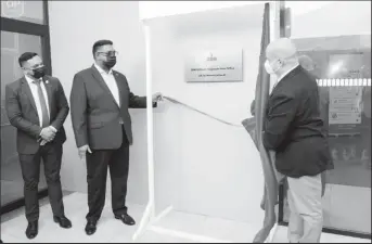  ?? ?? President Irfaan Ali (second from left) and General Manager of SBM Offshore, Francesco Prazzo (right) unveil the plaque as the company’s corporate office was officially opened. Minister of Natural Resources looks on (Office of the President photo)