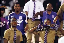  ??  ?? GLADSTONE TAYLOR/ PHOTOGRAPH­ER Kingston College supporters are gutted with dejection after seeing their highriding team defeated by Jamaica College at the National Stadium recently. KC had been unbeaten all season.