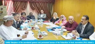  ??  ?? CAIRO: Members of the secretaria­t general and permanent bureau of the Federation of Arab Journalist­s (FAJ) attend a meeting in Cairo.