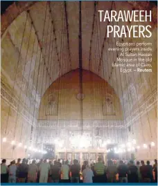  ?? — Reuters ?? Egyptians perform evening prayers inside Al Sultan Hassan Mosque in the old Islamic area of Cairo, Egypt.