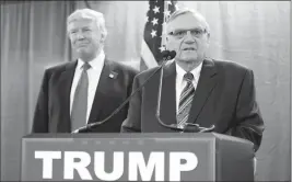  ?? ASSOCIATED PRESS ?? IN THIS JAN. 26, 2016, FILE PHOTO, THEN-REPUBLICAN PRESIDENTI­AL candidate Donald Trump was joined by Joe Arpaio, the sheriff of metro Phoenix, during a news conference in Marshallto­wn, Iowa. On Sunday, Trump told Fox News he may grant a pardon to the...