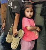  ?? Genaro Molina Los Angeles Times ?? MIGRANT FAMILIES, including children, are reportedly being told Border Patrol agents are asylum officers rather than law enforcemen­t.