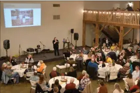  ?? PILOT NEWS GROUP PHOTO/JAMES MASTER ?? Park Manager Lacey Pfeiffer gives a presentati­on about the history of the Potawatomi Wildlife Park to those that attended Saturday’s annual banquet.