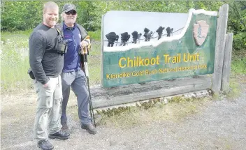  ?? TYLER MATHIESON ?? Ron Walsh, right, who is legally blind, hiked the Chilkoot Trail with help from his friend Tyler Mathieson in June. The entire hike took them seven days to complete.