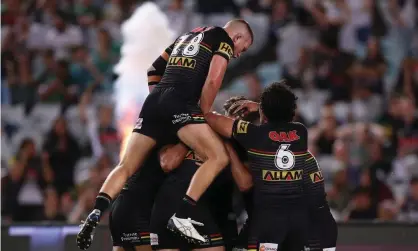  ?? Photograph: Mark Kolbe/Getty Images ?? Panthers players celebrate a try scored by Dylan Edwards during the NRL preliminar­y final against South Sydney.