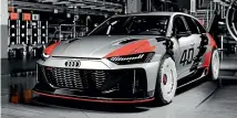  ??  ?? What do we have here.. . turbofan wheels, grey/red/white/black colour scheme, a side-exit exhaust. It must be an Audi GTO.