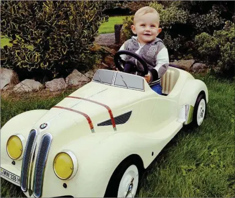  ??  ?? Rian Colgan , Ballyheigu­e, driving his 1930’s Vintage BMW .