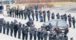  ?? ALEX BRANDON/AP ?? A hearse leaves the U.S. Capitol on Wednesday with the cremated remains of Capitol Police Officer Brian Sicknick, who was killed in the Jan. 6 storming of Congress.