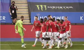  ??  ?? Manchester United players celebrate after Jesse Lingard’s goal sealed victory over Leicester. Photograph: Oli Scarff/AP