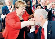  ??  ?? Jeremy Corbyn, the Labour leader, kisses the hand of Emily Thornberry, his shadow foreign secretary, at the launch of the party’s general election campaign in London yesterday