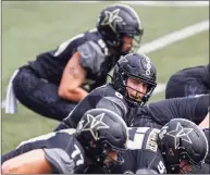  ?? Wade Payne / Associated Press ?? Former Barlow and Central Connecticu­t State offensive lineman Connor Mignone (77) started his third consecutiv­e game at right tackle for Vanderbilt.