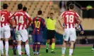  ?? Photograph: Marcelo del Pozo/Reuters ?? Jesús Gil Manzano shows Lionel Messi the red card in the Spanish Super Cup final.