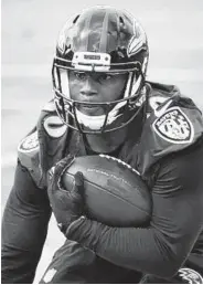  ?? KENNETH K. LAM/BALTIMORE SUN PHOTOS ?? Fourth-round draft pick Kenneth Dixon missed the first four games with a torn MCL in his left knee.