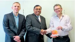  ??  ?? Managing Director Prasanna Karunatilk­a receives the award from GSK officials in London