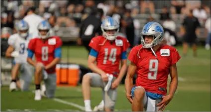  ??  ?? Detroit Lions quarterbac­ks Matthew Stafford (9), Jake Rudock (14) during NFL football practice on Tuesday in Napa, Calif. AP PhoTo/erIc rIsberg