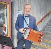  ?? MELISSA WONG/SPECIAL TO THE TELEGRAM ?? Dr. Glen Barry came to Seniors’ Day at city hall to provide background music. He is an accordion instructor.