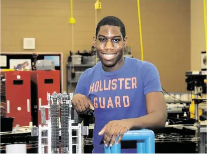  ?? George Wong / For the Chronicle ?? George Ranch High School senior Ejeh Okorafor is an engineerin­g whiz. Okorafor is a 2015 Gates Millennium Scholar. He is one of only 1,000 high schools students in the United States to have the entire cost of his education paid for through the program....